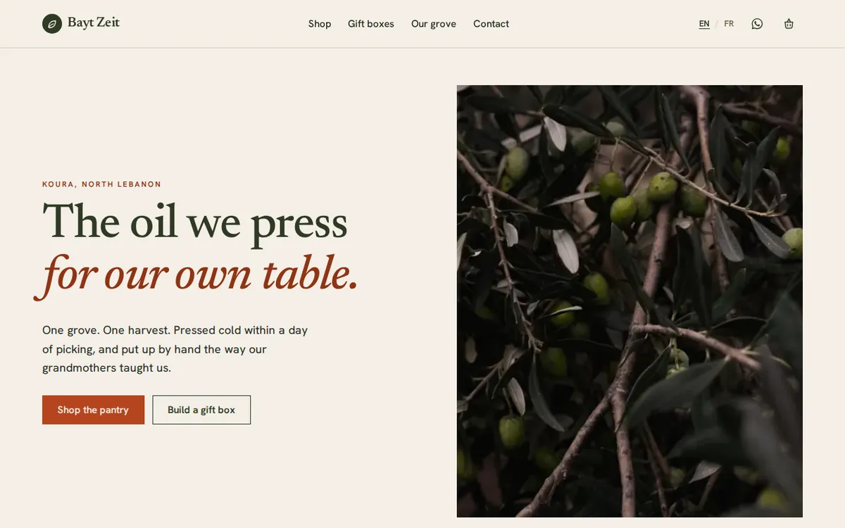 Bayt Zeit home page: the headline “The oil we press for our own table” beside a photograph of olives on the branch.